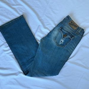 Vigils New York Distressed Bootcut Jeans.